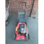 A QUATTRO BRIGGS & STRATTON LAWN MOWER