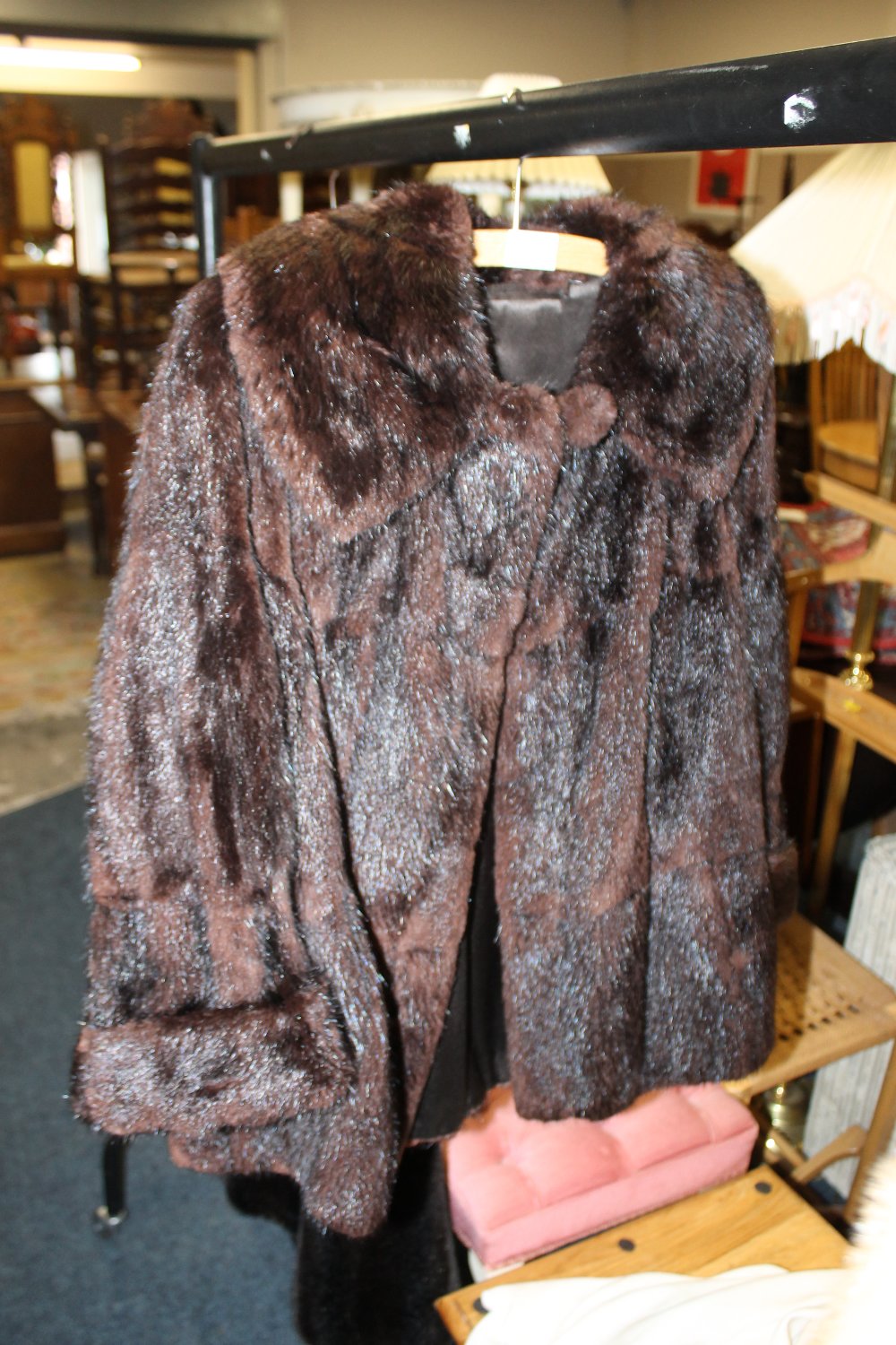 A LADIES VINTAGE BROWN FUR JACKET