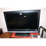 A HITACHI FLATSCREEN TV