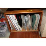 A CABINET CONTAINING LPS, SINGLES ETC
