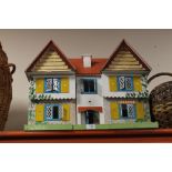 A VINTAGE DOLLS HOUSE