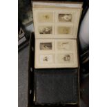 A BOX OF PHOTO ALBUMS / MUSICAL BOXES