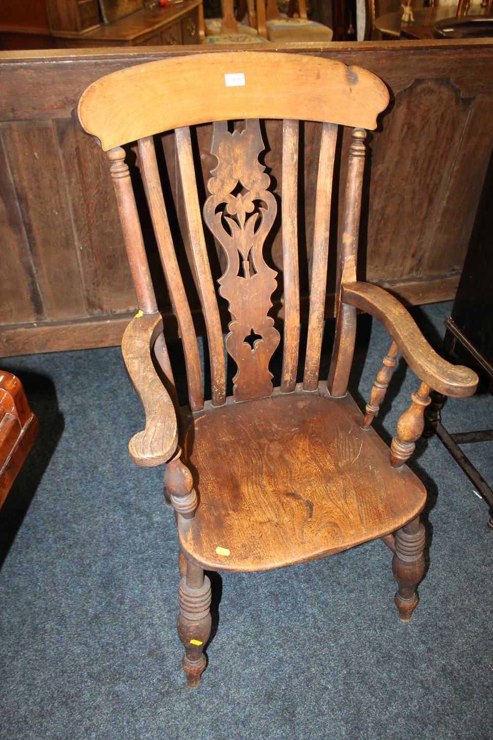 A TRADITIONAL WINDSOR KITCHEN ARMCHAIR