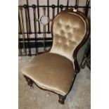 A MAHOGANY SPOON BACK CHAIR