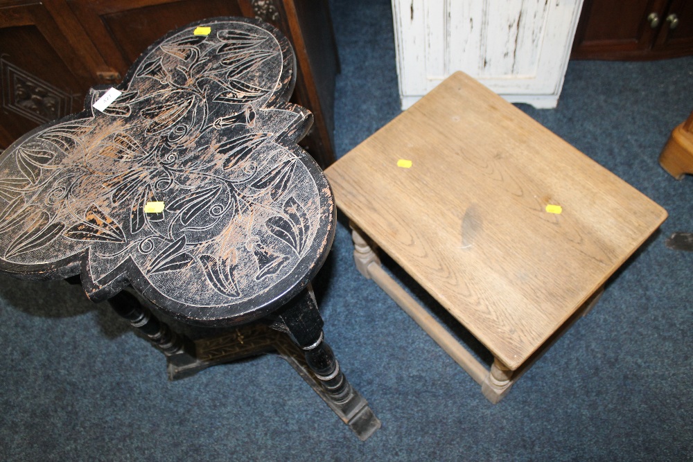 A CARVED OAK CLOVER LEAF TABLE AND A SMALLER OAK TABLE (2)