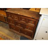 A COLONIAL STYLE EIGHT DRAWER CHEST