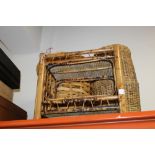 A BAMBOO MAGAZINE RACK, WICKER LIDDED LAUNDRY BASKET + ANOTHER (3)