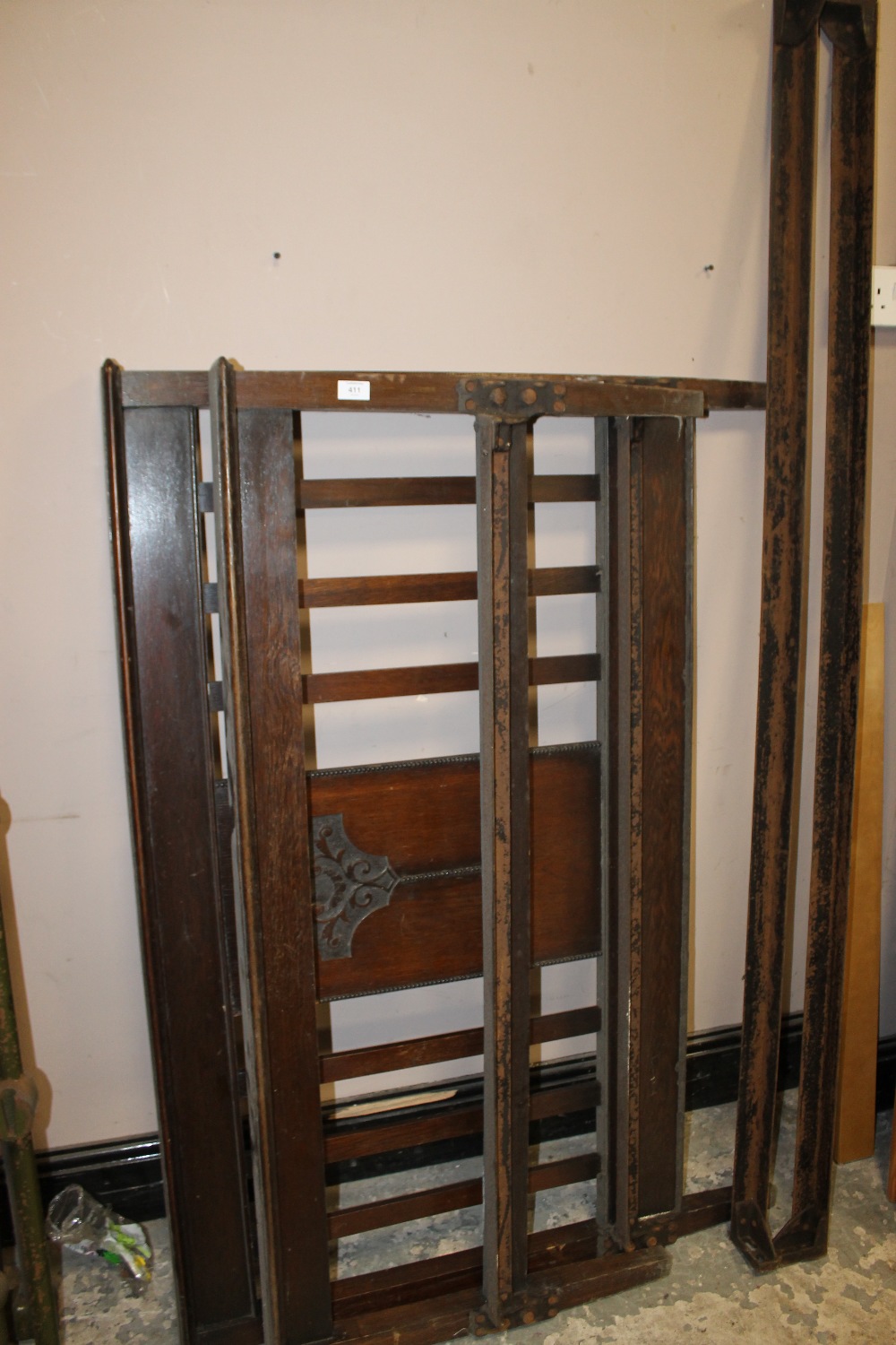 AN OAK FRAMED BEDSTEAD + A SINGLE BED