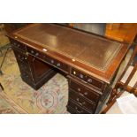 A REPRODUCTION MAHOGANY TWIN PEDESTAL DESK