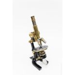 C. Reichert Brass Compound Monocular Microscope.