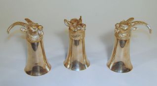 3 jagdliche Sturzbecher Bronze versilbert,die Becher mit vollplastischen Widderköpfen und einem
