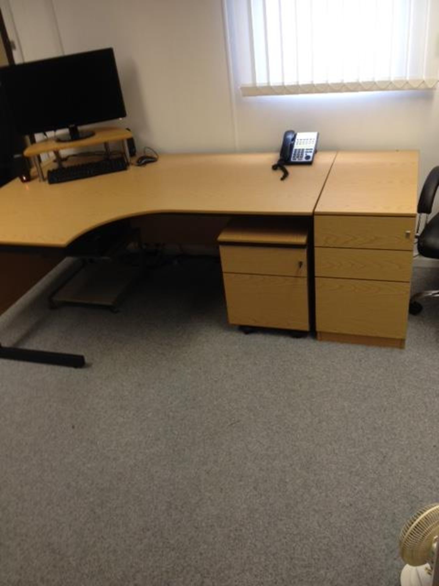 Woodgrain veneer curve front corner desk with matching roll under two drawer pedestal and separate