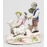 Skulpturengruppe "Kinderpaar, eine Ziege fütternd". Fayence. Weiße Glasur mit polychromer