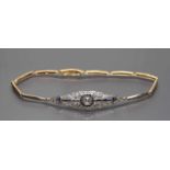 Art Deco-Damenarmband. 18 kt. GG und WG, geprüft, brutto 5,3 g. Durchbrochen gearbeitete,