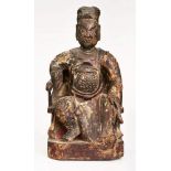 Figur "Auf dem Thron sitzender Herrscher",China wohl 19. Jh. Holz alt, farbig und gold gefaßt.