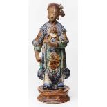 Keramikfigur, China 17./18. Jh. Bunt glasiert. Stehende Figur in reich geschmücktem Gewand, den