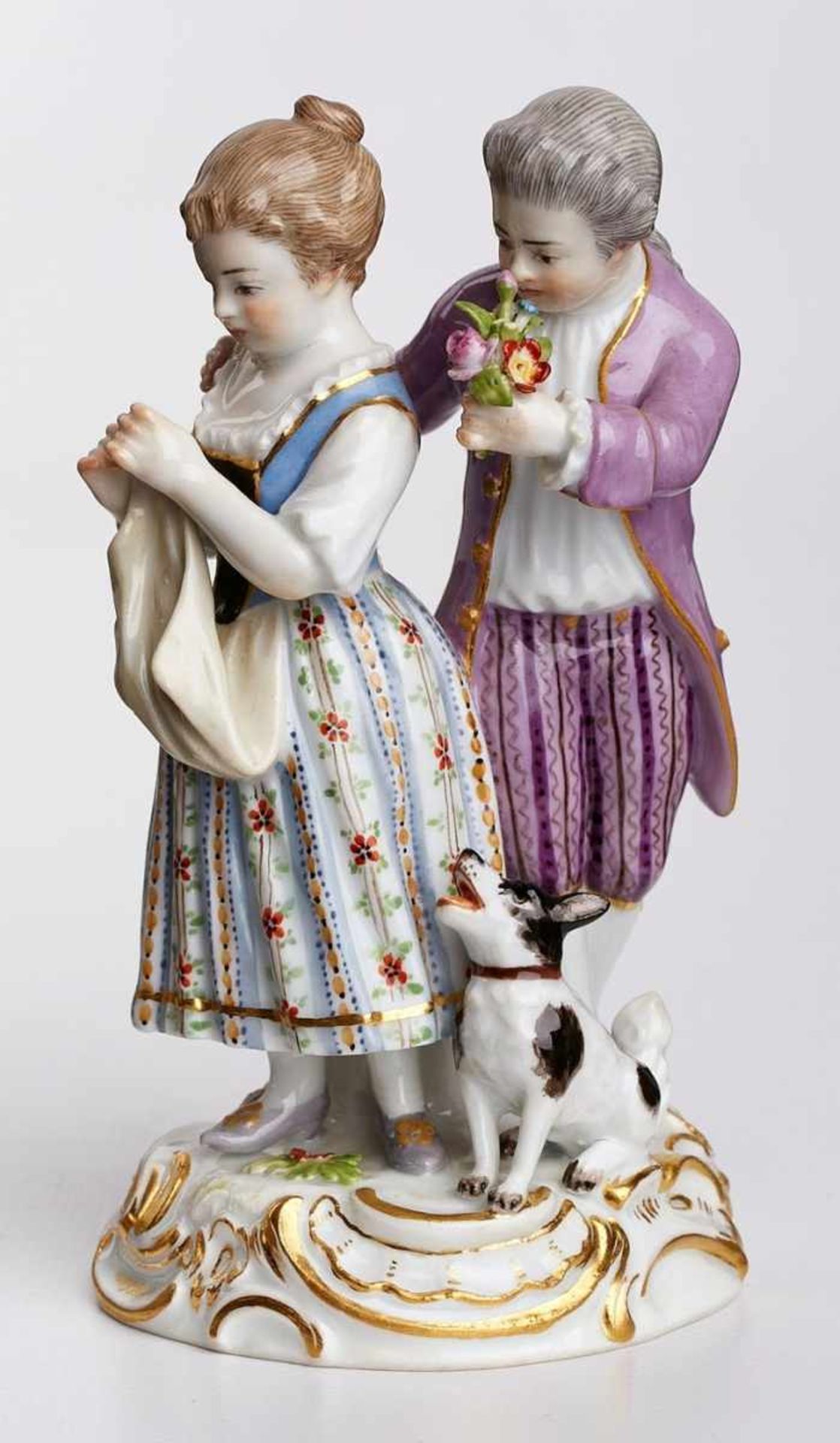 "Die kleine Hartnäckige", Meissen um 1890. Rocaillen-gerahmter Sockel, darauf Kinderpaar m. Hund,