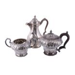 A late Victorian silver baluster three piece tea service by W.  &  C. Sissons (Walter  &  Charles