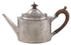 A George III silver straight-sided oval tea pot by Robert Hennell I,   London 1794, with a wooden