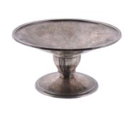 A hammered silver circular pedestal sweet dish by Liberty  &  Co.,   Birmingham 1937, the shaped