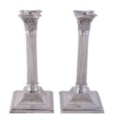 A pair of Edwardian silver Corinthian column candlesticks by J. Sherwood  &  Sons,   Birmingham