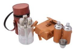 A stainless steel hunting spirits set in a leather case by Asprey,   of two leather mounted flasks