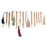 A selection of propelling pencils and pencils,   including various makes, some with tassel ends