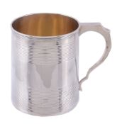 A George III silver coopered mug,   maker's mark poorly struck (..M), London 1831, with a stylised