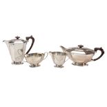 A matched silver tapered canted-rectangular four piece tea service by Frank Cobb  &  Co. Ltd,