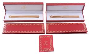 Cartier, must de Cartier, a gold plated ball point pen,   no. 505084, circa 1985, with reeded
