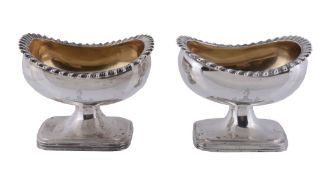 A pair of Chinese export silver oblong pedestal salt cellars by Wo Shing   (WS only),  Canton and