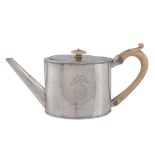 A George III silver oval teapot by William Vincent,   London 1781, with an ivory final to the flat