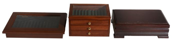 A wooden three draw pen cabinet,   with glazed top, 23.5cm x 18cm x 12.5cm; together with two other