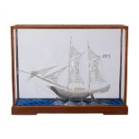 A silver coloured model of a twin masted sailing ship,   stamped   900   only, probably Asian,