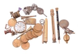 A collection of items,   to include: fifteen gilt metal circular gaming counters, the obverse with