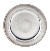 A German silver coloured serving plate,   maker's mark PPSR (not traced), post 1886, with a nulled