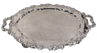 An electroplated shaped oval twin handled tray,   early 20th century, with a fruiting vine relief