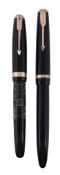Parker, Vacumatic, a laminated black fountain pen,   with a black cap and barrel, and vacumatic