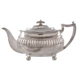 A late George III Scottish silver oblong baluster tea pot by P. Cunningham  &  Son,   Edinburgh