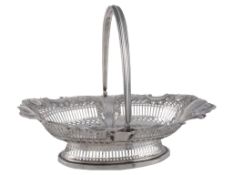An Edwardian silver shaped oval basket by S. Glass,   Birmingham 1902, with a threaded swing