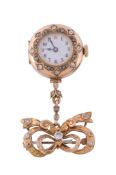 A 14 carat gold brooch watch,   no. 95061, manual wind movement, 15 jewels, white enamel dial,