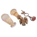 A Victorian citrine swivel desk seal,   the scroll foliate chased mount with five seals, the