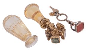 A Victorian citrine swivel desk seal,   the scroll foliate chased mount with five seals, the
