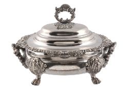 An electro-plated oblong baluster soup tureen and cover,   with a foliate loop handle to the ogee