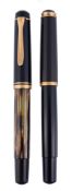 Pelikan, a brown fountain pen,   with a tortoise shell effect barrel and brown cap, the nib stamped