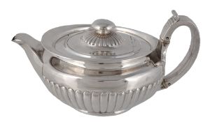 A George III silver cape pattern tea pot by William Burwash  &  Richard Sibley,   London 1807, with