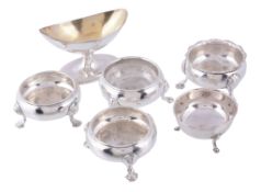 Six various silver salt cellars,   comprising: a George II pair of cauldron shape by David Hennell