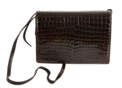 Fendi, a brown crocodile shoulder/clutch bag  , with detachable leather strap and button fastening,