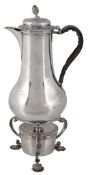A George III silver coffee jug on an associated stand,   the jug, maker's mark   TJ   (