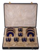 A set of six Royal Worcester bone china coffee cups and saucers,   puce printed marks, pattern C.